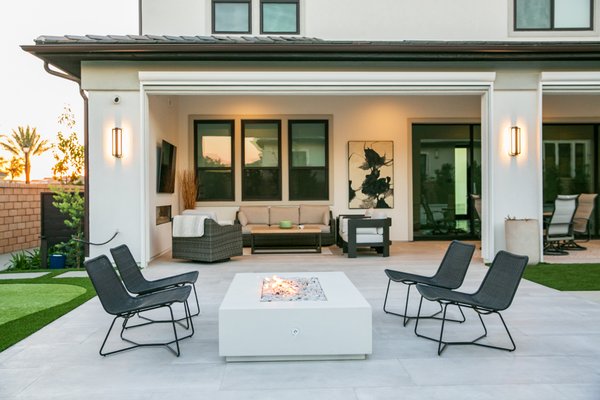 Outdoor Living at its Best - For this project, we wanted to capture the true indoor and outdoor living lifestyle. We achieved this by incorporating the California room as an extension of the inside of the house to transition into the outside pool and hardscape area. The California room was transformed into an outdoor kitchen and outdoor living room. We used clean lines and contemporary materials to reflect the inside furnishings and bring them outdoors. Outdoor Living at its Best - For this project, we wanted to capture the true indoor and outdoor living lifestyle. We achieved this by incorporating the California room as an extension of the inside of the house to transition into the outside pool and hardscape area. The California room was transformed into an outdoor kitchen and outdoor living room. We used clean lines and contemporary materials to reflect the inside furnishings and bring them outdoors.