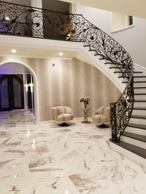 Custom Staircase Design and Installation - OC Elite Remodeling took this project to a new level. We ripped out the old staircase and installed brand new steps, railing and finishing touches. As you can see this turned out breathtaking.