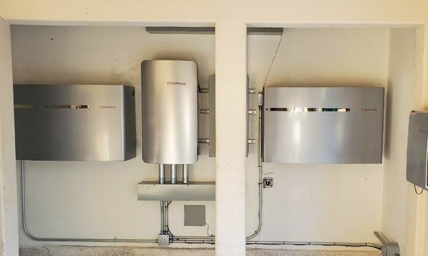 Enphase Battery Storage System - This customer was looking to add 20kWh of storage to his solar system and was very keen to install the system in his garage despite recent code changes restricting inside installation. Our general manager, Zach, went to work to find a solution that would enable permitting in one of the toughest building departments in the Bay Area. Not only did he find a solution, but he was complimented by the head inspector and later interviewed by local solar leaders so more customers could benefit from his idea! We also pretty proud of how nice it looks installed. Enphase Battery Storage System - This customer was looking to add 20kWh of storage to his solar system and was very keen to install the system in his garage despite recent code changes restricting inside installation. Our general manager, Zach, went to work to find a solution that would enable permitting in one of the toughest building departments in the Bay Area. Not only did he find a solution, but he was complimented by the head inspector and later interviewed by local solar leaders so more customers could benefit from his idea! We also pretty proud of how nice it looks installed.
