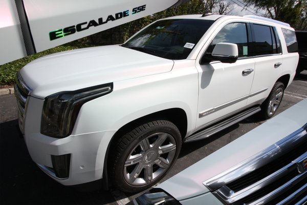 2018 Cadillac Escalade ESV Color change Wrap in Satin Pearl White Chameleon - Wrapping This 2018 Cadillac Escalade ESV Color change Wrap in Satin Pearl White Chameleon was no walk around the park. Painstaking Details were requested by this client to recreate an exciting and artistic environment wherever the car goes. This is truly an Escalade on an Escapade!