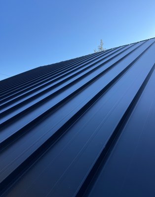 Roof Projects: Flat, Low Pitch, High Pitch & A-Frame Roofs Installation — Rigid Roofing Corp - Rigid Roofing Corp. installs standing seam, concealed fastener, and specially engineered metal roofing systems tailored for flat roofs, low pitch roofs, high pitch roofs, and A-frame style roofs in snow-prone areas of California (Lake Tahoe, Sierra, high elevation Bay Area), plus counties throughout Northern California. Our team is skilled in designing panels, seams, and underlayment systems that handle snow load, water runoff, ice dams, and wind uplift. From cabins in Tahoe and Truckee to custom luxury homes in Marin, Palo Alto, and Hillsborough, we manage complex roof geometries and deliver beautiful, long-lasting roofing solutions.
flat metal roof installation, low pitch standing seam, high pitch metal roof, A-frame metal roofs Tahoe, snow load roofs Bay Area, roof replacement Northern CA. Roof Projects: Flat, Low Pitch, High Pitch & A-Frame Roofs Installation — Rigid Roofing Corp - Rigid Roofing Corp. installs standing seam, concealed fastener, and specially engineered metal roofing systems tailored for flat roofs, low pitch roofs, high pitch roofs, and A-frame style roofs in snow-prone areas of California (Lake Tahoe, Sierra, high elevation Bay Area), plus counties throughout Northern California. Our team is skilled in designing panels, seams, and underlayment systems that handle snow load, water runoff, ice dams, and wind uplift. From cabins in Tahoe and Truckee to custom luxury homes in Marin, Palo Alto, and Hillsborough, we manage complex roof geometries and deliver beautiful, long-lasting roofing solutions.
flat metal roof installation, low pitch standing seam, high pitch metal roof, A-frame metal roofs Tahoe, snow load roofs Bay Area, roof replacement Northern CA.