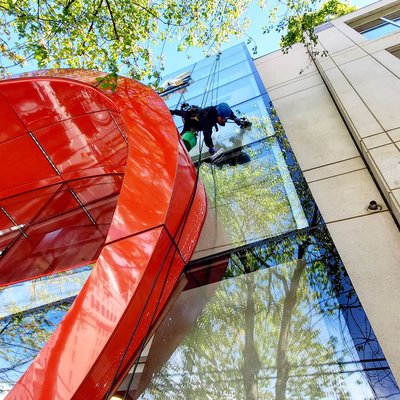 Exterior window cleaning - Window cleaning work via rope access at Sport Check in Robson st, Vancouver Exterior window cleaning - Window cleaning work via rope access at Sport Check in Robson st, Vancouver