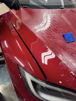 Tesla Model S PPF Removal, Reinstall & Ceramic - 2013 Tesla Model S with aged Paint Protection Film removed from the front end, followed by new PPF installation on the front and a ceramic coating applied over the new film and the restored painted surfaces. Before, during and after photos show the complete protection renewal process. Tesla Model S PPF Removal, Reinstall & Ceramic - 2013 Tesla Model S with aged Paint Protection Film removed from the front end, followed by new PPF installation on the front and a ceramic coating applied over the new film and the restored painted surfaces. Before, during and after photos show the complete protection renewal process.