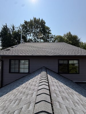 Complete Roof Replacement, Architectural Shingle Roof Replacement, New Shingle Roofing – Seattle Area. - Complete replacement of an asphalt shingle roof on a private home. Our team removed the old roof, prepared the roof surface, installed a new underlayment and architectural shingles, and carefully finished the ridge caps and all critical areas of the roof. The result is a neat and durable roofing system designed to protect the home from the weather conditions of the Pacific Northwest. Black Rock Builds provides professional roofing replacement and repair services, as well as installation of asphalt shingles and metal roofing throughout the Greater Seattle area. Contact us for a free roof inspection and estimate