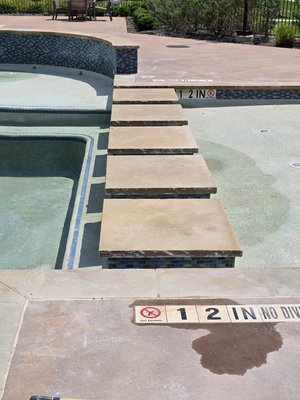 Apartments Garland Texas - this repair was removing stones, rebuilding mudbed and installing new stones