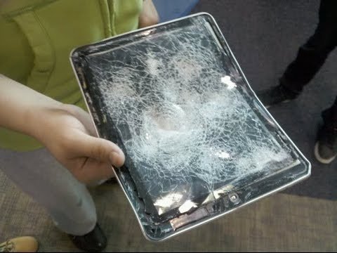 IPAD REPAIR- Slammed in the SUV back door. We can fix your iPad no matter what the problem is or how bad it is. - No one else would even attempt this. This iPad was smashed when the owner slammed the back hatch door of his SUV on it. He had no idea what happened or that the ipad was in there and slammed it shut again and bent it in a C. The customer said 4 other repair shops including the manufacture said it was impossible to repair and to buy a new one. We did the impossible and fixed it We take on every job no matter how hard or easy and can repair anything. Thats what being in business for over 34 years and massive experience can do. IPAD REPAIR- Slammed in the SUV back door. We can fix your iPad no matter what the problem is or how bad it is. - No one else would even attempt this. This iPad was smashed when the owner slammed the back hatch door of his SUV on it. He had no idea what happened or that the ipad was in there and slammed it shut again and bent it in a C. The customer said 4 other repair shops including the manufacture said it was impossible to repair and to buy a new one. We did the impossible and fixed it We take on every job no matter how hard or easy and can repair anything. Thats what being in business for over 34 years and massive experience can do.