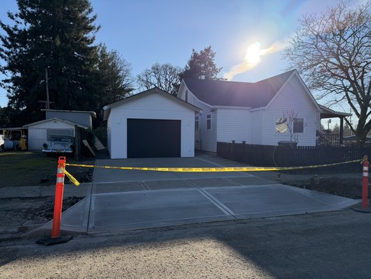 DQ project - We poured the foundation for the garage edition on this house and then came back to pour the apron, city sidewalk and driveway  DQ project - We poured the foundation for the garage edition on this house and then came back to pour the apron, city sidewalk and driveway 