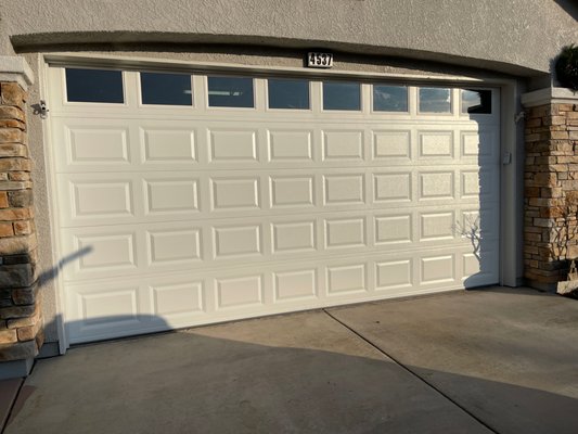 Monte Mar Drive El Dorado Hills - White Short Panel Garage Door - CHI garage doors are a popular brand of residential garage doors known for their durability and high quality. CHI doors are made from premium materials such as steel, wood, and composite, and are available in a variety of colors and finishes to match the exterior of your home. In addition to their aesthetic appeal, CHI garage doors are also known for their energy efficiency and security features, making them a popular choice for homeowners.
The raised panels start with a recessed edge, but the interior surface of each panel is brought slightly forward, adding just a hint of definition to a classic garage door design. Track system sold separately.