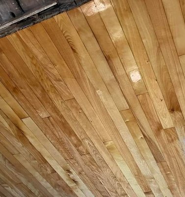 Hardwood Restoration - This Floor restoration was done downtown for a coffee Shop. The Unit had Carpets covering !st edition hardwood floors! See the transformation.