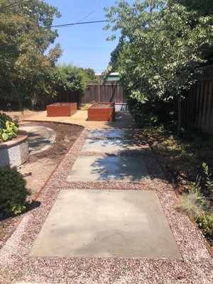 Los Altos Project - Partial backyard transformation concrete stepping stones and walkway extension and wood planters. Los Altos Project - Partial backyard transformation concrete stepping stones and walkway extension and wood planters.