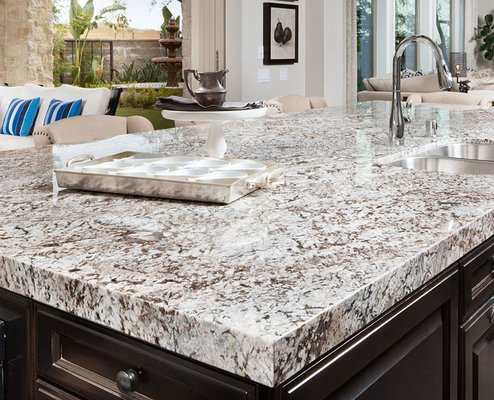 Natural Stone Kitchen Countertops - Granite is an all-natural stone product, mined from the earth. Offered in a wide variety of colors and patterns, every slab is unique. Most granite comes with a highly polished finish, although some stone comes with a honed surface. Natural Stone Kitchen Countertops - Granite is an all-natural stone product, mined from the earth. Offered in a wide variety of colors and patterns, every slab is unique. Most granite comes with a highly polished finish, although some stone comes with a honed surface.