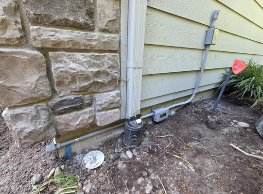 New Outdoor Outlets - For this project, we installed about 25 feet of surface-mounted PVC conduit and added two weather-rated, GFCI-protected outlets, giving the client safer and more convenient access to power outside.
