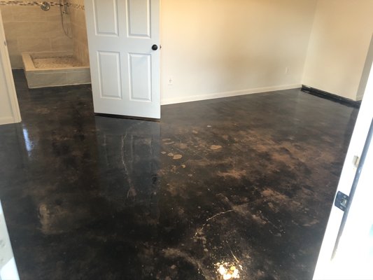 Acid Stain Concrete - The clients requested acid stained concrete flooring which is great because it is cheaper then tile and last a very long time. They choose dark brown with a clear coat finish. And loved the finished results.