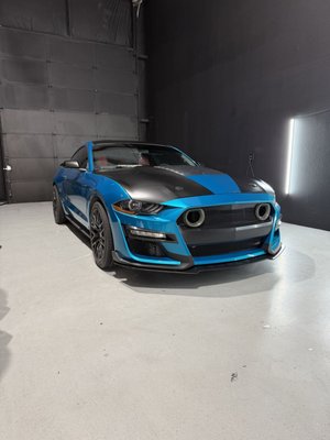 Ford Mustang – 3M Atomic Teal Full Wrap - Full color change wrap on this Ford Mustang using 3M Atomic Teal vinyl, giving it a bold, vibrant finish that complements its sporty body lines. Ford Mustang – 3M Atomic Teal Full Wrap - Full color change wrap on this Ford Mustang using 3M Atomic Teal vinyl, giving it a bold, vibrant finish that complements its sporty body lines.