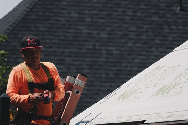 Roofing Job - This is a photo of one of our crews out on a job site. Roofing Job - This is a photo of one of our crews out on a job site.