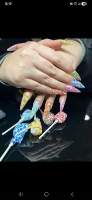 Edgy Nail Art & Custom Designs - This project highlights a collection of custom nail art sets created at New Moon Nails, located inside the Cottage Salon. Each set is tailored to the client’s style, ranging from playful and colorful designs to spooky, edgy, and bold statement nails. I focus on clean application, creative detail, and long-lasting results while providing a relaxed, comfortable experience for every client. Edgy Nail Art & Custom Designs - This project highlights a collection of custom nail art sets created at New Moon Nails, located inside the Cottage Salon. Each set is tailored to the client’s style, ranging from playful and colorful designs to spooky, edgy, and bold statement nails. I focus on clean application, creative detail, and long-lasting results while providing a relaxed, comfortable experience for every client.