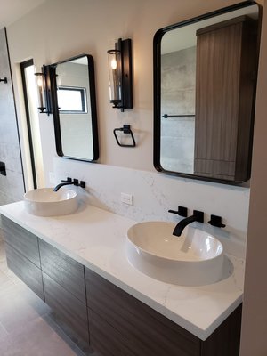 Bathroom Remodel in Long Beach - Fully remodeled bathroom with modern features. His/her sinks and walk in shower. We worked closely with a high-end designer to deliver an exceptional finished product that the customer was thrilled with. Bathroom Remodel in Long Beach - Fully remodeled bathroom with modern features. His/her sinks and walk in shower. We worked closely with a high-end designer to deliver an exceptional finished product that the customer was thrilled with.