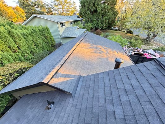 Roof Replacement with Ridge Vent Upgrade - This home received more than just a new roof; it got a full upgrade in attic ventilation with the addition of ridge vents. These vents are installed along the peak of the roof and are designed to let hot, humid air escape from the attic year-round, which helps extend the life of the roofing system, keeps the attic cooler in the summer, and prevents moisture-related issues in the winter. Roof Replacement with Ridge Vent Upgrade - This home received more than just a new roof; it got a full upgrade in attic ventilation with the addition of ridge vents. These vents are installed along the peak of the roof and are designed to let hot, humid air escape from the attic year-round, which helps extend the life of the roofing system, keeps the attic cooler in the summer, and prevents moisture-related issues in the winter.