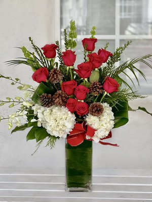 Winter & Holiday Flowers - Some of our featured winter & holiday creations!! Perfect gifts for loved ones or to bring some joy into your own home. We can create speciality arrangements for Christmas, Hanukah, New Years, and more! Winter & Holiday Flowers - Some of our featured winter & holiday creations!! Perfect gifts for loved ones or to bring some joy into your own home. We can create speciality arrangements for Christmas, Hanukah, New Years, and more!