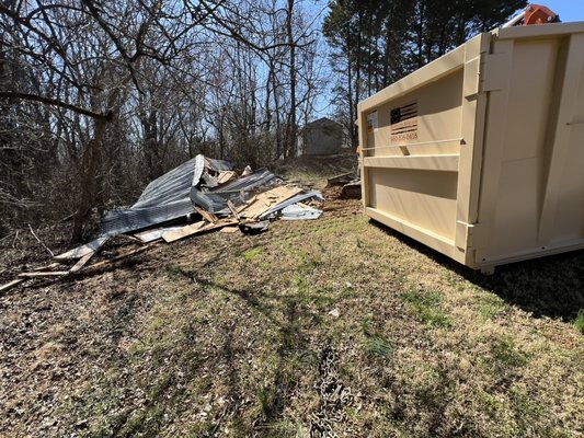 Demolition Project - This project was a smaller demolition of a 16x20 building that was in a backyard and unable to be removed any other way. We utilized one of our mini excavators and 30 yard dumpsters to removed the structure as if it were never there.