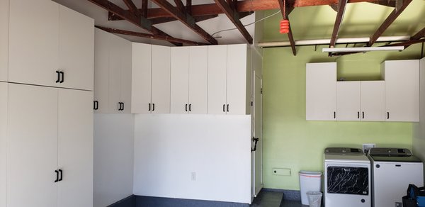 Custom Cabinets Garage - The customer wanted cabinets and storage in her garage. I custom built cabinets to fit her space and then installed them one section at a t Custom Cabinets Garage - The customer wanted cabinets and storage in her garage. I custom built cabinets to fit her space and then installed them one section at a t