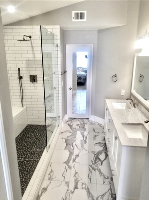 Bathroom Remodeling - Complete bathroom remodel. Ca restoration and construction dose it all from flooring, tile, cabinets, vanity and mich more.