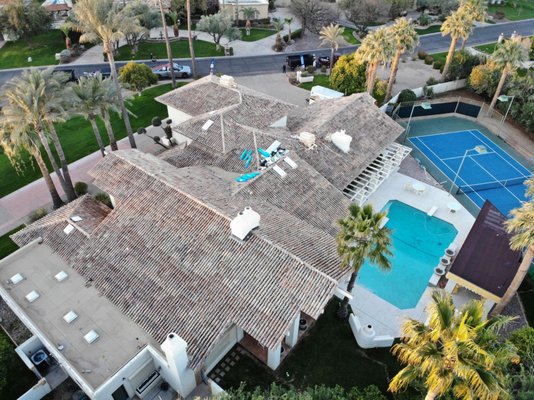 Remove and replace - This home had an old skool clay tile roof that needed replacing due to wind and water damages. The remove and replace method consist of completely removing all paper and metal from the roof and replacing with new.