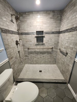 Bathroom Remodel - At Juravle Tile & Remodeling, we provide full-service, start-to-finish renovations, including tub and shower conversions and accessibility upgrades. We handle every detail with no hassle or mess, turning your dream bathroom into reality. Bathroom Remodel - At Juravle Tile & Remodeling, we provide full-service, start-to-finish renovations, including tub and shower conversions and accessibility upgrades. We handle every detail with no hassle or mess, turning your dream bathroom into reality.