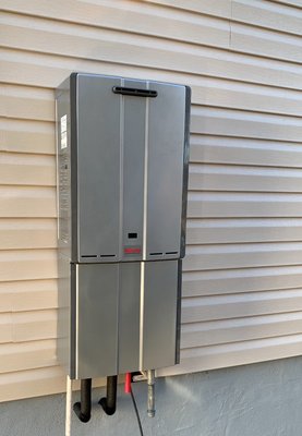 Tankless Water Heater Install - This install was removing an existing electric tank water inside home and tying into gas line and installing a new Rinnai tankless. Tankless Water Heater Install - This install was removing an existing electric tank water inside home and tying into gas line and installing a new Rinnai tankless.