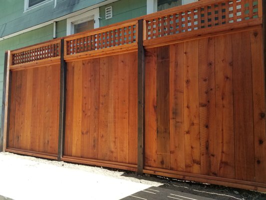 A custom Redwood Fence Installation for privacy - A custom Redwood Fence construction to provide privacy in Berkeley. A custom Redwood Fence Installation for privacy - A custom Redwood Fence construction to provide privacy in Berkeley.
