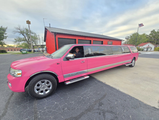 The "Pinkey" - Holding up to 12 passengers! Prepare to turn heads and steal hearts with the "Pinkey", our one-of-a-kind pink Lincoln Navigator limo! Whether it’s a birthday bash, prom night, or a bachelorette party, Pinkey is the ultimate ride for creating unforgettable memories. Ready to ride? Visit us online to fill out an inquiry or give us a call! The "Pinkey" - Holding up to 12 passengers! Prepare to turn heads and steal hearts with the "Pinkey", our one-of-a-kind pink Lincoln Navigator limo! Whether it’s a birthday bash, prom night, or a bachelorette party, Pinkey is the ultimate ride for creating unforgettable memories. Ready to ride? Visit us online to fill out an inquiry or give us a call!