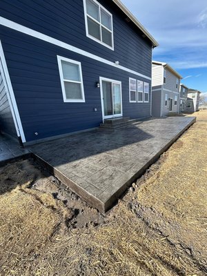 Stamped concrete patio - This stamped concrete patio was done on a brand new house. The concrete patio added value to the property and the homeowner was really pleased with the results, as the summer approaches they can enjoy and entertain family and friends.