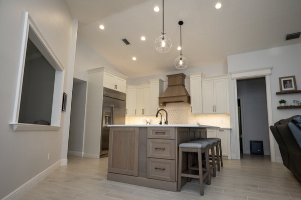 Kitchen BEFORE & AFTER - Incredible transformation adding a hood and removing the bar while enlarging the island with a bar overhang. Kitchen BEFORE & AFTER - Incredible transformation adding a hood and removing the bar while enlarging the island with a bar overhang.
