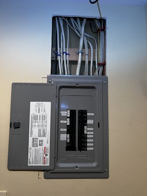 100 AMP subpanel replacement and relocation - Removing old subpanel, running wires to the new location and installing new 100 AMP Subpanel
