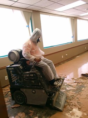 Asbestos floor tile removal - "This was a job to remove Asbestos tile. When materials that contain asbestos deteriorate over time or become disturbed or damaged due to physical contact, building renovation, and demolition, dangerous asbestos fibers are released into the air and are inhaled by your family, employees or tenants. Let us help you remove Asbestos safely!