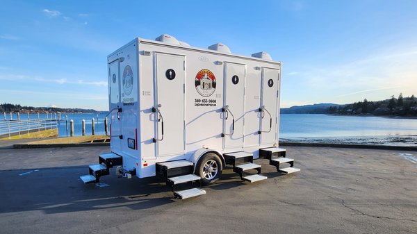 Cozy Cove Restroom Trailer, LLC - Cozy Cove Restroom Trailer provides luxury portable restrooms for your wedding. Our trailers have full vanities with mirrors, sinks with hot water, flushable toilets, heat & AC, music, indoor/outdoor lighting. Your guests will thank you for renting our trailer.