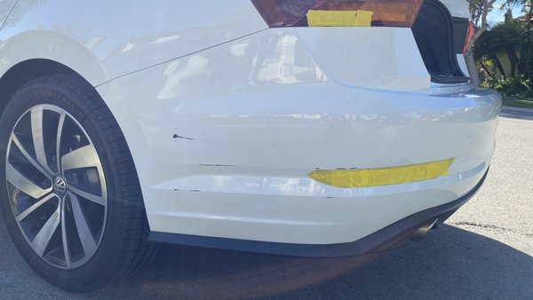 This scratch repair on the rear bumper is top quality service! - The rear bumper on the driver side was scratched up badly. We resurfaced it by sanding, priming, painting and blending it to get the desired finish. It came out great! Come and text us your photos at 858-943-9559 for a quick quote. Our repairs are mobile so we can come to you! This scratch repair on the rear bumper is top quality service! - The rear bumper on the driver side was scratched up badly. We resurfaced it by sanding, priming, painting and blending it to get the desired finish. It came out great! Come and text us your photos at 858-943-9559 for a quick quote. Our repairs are mobile so we can come to you!