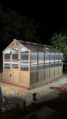 Cedar poly greenhouse. - Install a Cedar Poly greenhouse with redwood floor decking, water and electricity connections inside.