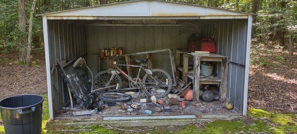 Shed removal incuding junk/ Clutter inside  knocked down hauled away from property. Clean site, another happy Customer. - demolition and site cleanup of a smaller building, shed before and after, Results. Another happy customer.