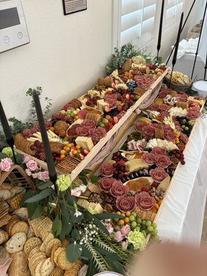 Layered grazing fromage table - ✨ Two-Tier Grazing Table – Baby Shower Edition

Celebrate your little one’s arrival with an unforgettable edible experience. Our Two-Tier Grazing Table is designed to elevate your baby shower with stunning visual presentation and decadent flavors. Featuring an abundant display of artisan cheeses, premium cured meats, fresh seasonal fruits, crisp vegetables, dips, nuts, and gourmet accompaniments, this table creates a breathtaking centerpiece guests will talk about long after the party ends.

Perfect for adding a touch of elegance and warmth to your celebration, each grazing table is custom-styled to match your baby shower theme and color palette. Whether you’re welcoming a baby girl, boy, or celebrating a neutral or luxe aesthetic, our two-tier design ensures a layered, elevated presentation to delight every guest.

✨ Ideal For: Baby Showers, Gender Reveals, Sip & See Gatherings
✨ Serves: Small to large gatherings with abundant variety and beauty
✨ Includes: Two-tier setup, premium styling, and personalized touches to make your celebration effortlessly memorable.