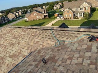 roof repair - Wind had blown a fw shingles off and needed to be replaced. A quick trip out there and we got the roof back to being watertight