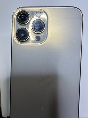 Cracked camera lens repair - This iphone came to our phone store to have their cracked back camera lens and customer came out in less than 30 min happy with his iPhone fixed ready for trade in for his carrier.