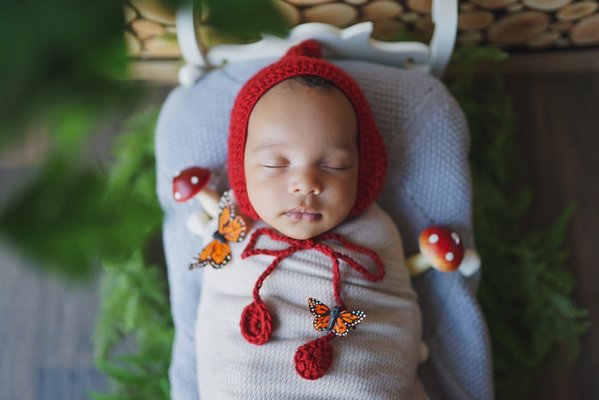 Baby Boy - This handsome little cutie was a precious angel and slept most of his session! I got to dress him up like a little doll and had so much fun !
