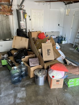 Garage Clean Out - 2024 - This garage clean-out in the San Gabriel Valley is a great example of how we transform cluttered spaces into clean, functional areas. The space was filled with a mix of cardboard, recyclables, and household items. Our team quickly assessed the items, sorted them for disposal, recycling, and donation, and removed everything in one seamless process.

Our professional garage clean-out services are designed to save you time and hassle. Whether it’s boxes, furniture, or general clutter, we have the tools and expertise to handle jobs of all sizes. By focusing on eco-friendly practices, we ensure as much as possible is recycled or donated, minimizing waste and giving back to the community.

For this particular job, the homeowner needed the space cleared for a new project, and we delivered results within hours. The transformation is remarkable—you can now imagine this space as a functional garage, workshop, or storage area.

If you’re in the San Gabriel Valley and need a dependable team to handle your garage clean-out or junk removal, give us a call. We specialize in quick, efficient, and eco-friendly clean-up services for residential and commercial properties. From single-item pickups to complete space clean-outs, we’re here to help!