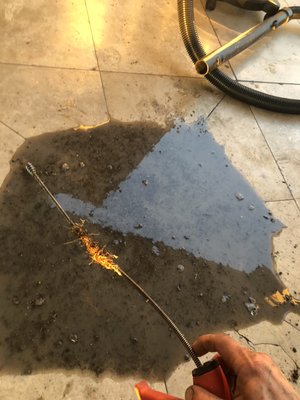 Unclogging storm drains - Home owner requested his clogged up storm drains to be serviced, i cabled through making a tiny entry, then turned on 4,000psi of high pressure water “hydro jetting” 150 feet shredding any root in the way forcing and shaping pipe back to its natural flow
