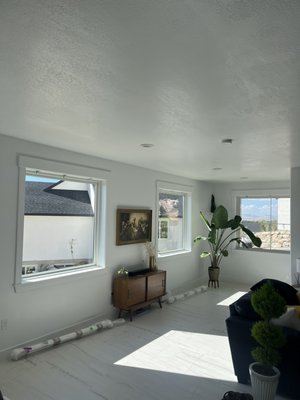 Willard bay windows - Just wrapped up a stunning installation for a home with breathtaking views of Willard Bay! These beautiful picture windows are now framed with custom light-filtering shades that allow natural light to pour in while maintaining privacy and reducing glare. The fabric the client chose adds a subtle elegance to the space, enhancing both the view and the ambiance. Check out the photos for a glimpse of how these shades blend function and style!
