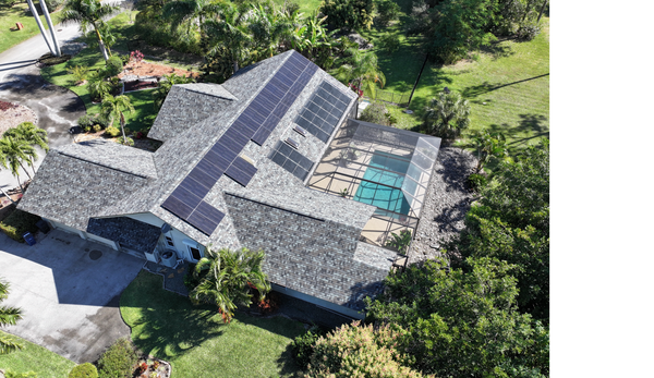 Solar Electric System and Solar Pool Heater in Bonita Springs, FL - We brought the power of the sun to this home and pool in Bonita Springs, FL.  By installing a solar electric system and solar pool heater, these homeowners extended their swim season and are safeguarding against the average 3% annual utility rate increases in Florida.  They are only paying $26/month to be connected to the grid and may receive a credit for any additional power they create but are unable to use.  That credit will automatically be applied to their future electric bill.
