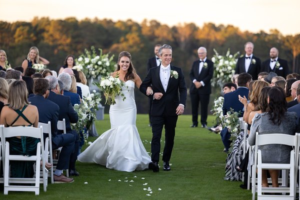 Weddings - This beautiful ceremony was held at Piedmont Driving Club golf course in October 2021. The Sidewalk Garden provided full-service floral design, production and installation which included personal flowers for the wedding party, large garden-party style urns and aisle pew arrangements for the ceremony, potted live plants, and dozens of tabletop arrangements for the reception. Weddings - This beautiful ceremony was held at Piedmont Driving Club golf course in October 2021. The Sidewalk Garden provided full-service floral design, production and installation which included personal flowers for the wedding party, large garden-party style urns and aisle pew arrangements for the ceremony, potted live plants, and dozens of tabletop arrangements for the reception.