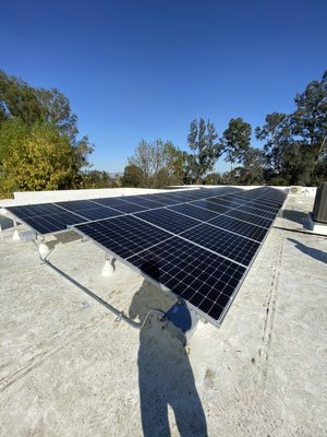14 KW system with Hyundai 360 watt panels and Solaredge Inverter on a flat TPO roof application located in Tarzana, CA - This project was completed for a long time client and developer who built a new modern home in Tarzana, CA. His goal was to build a net zero home where the homeowners will have no utility bills. We installed a commercial grade 14 KW system with optimizers from solar edge and a solaredge inverter. We used iron ridge racking with special TPO boots for waterproofing the penetrations. We finished off the installation by installing an automated water sprinkler system that will rinse off the panels on a weekly basis. This way the homeowner will not need to get on his or her roof to keep the panels clean! 14 KW system with Hyundai 360 watt panels and Solaredge Inverter on a flat TPO roof application located in Tarzana, CA - This project was completed for a long time client and developer who built a new modern home in Tarzana, CA. His goal was to build a net zero home where the homeowners will have no utility bills. We installed a commercial grade 14 KW system with optimizers from solar edge and a solaredge inverter. We used iron ridge racking with special TPO boots for waterproofing the penetrations. We finished off the installation by installing an automated water sprinkler system that will rinse off the panels on a weekly basis. This way the homeowner will not need to get on his or her roof to keep the panels clean!