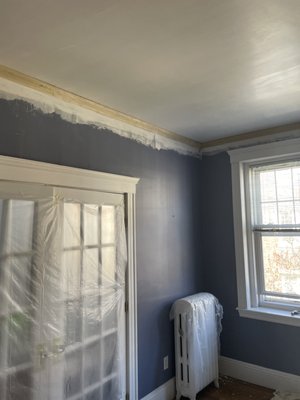 Crown molding installation - Crown molding trim was installed, prepped, then painted. Crown molding installation - Crown molding trim was installed, prepped, then painted.